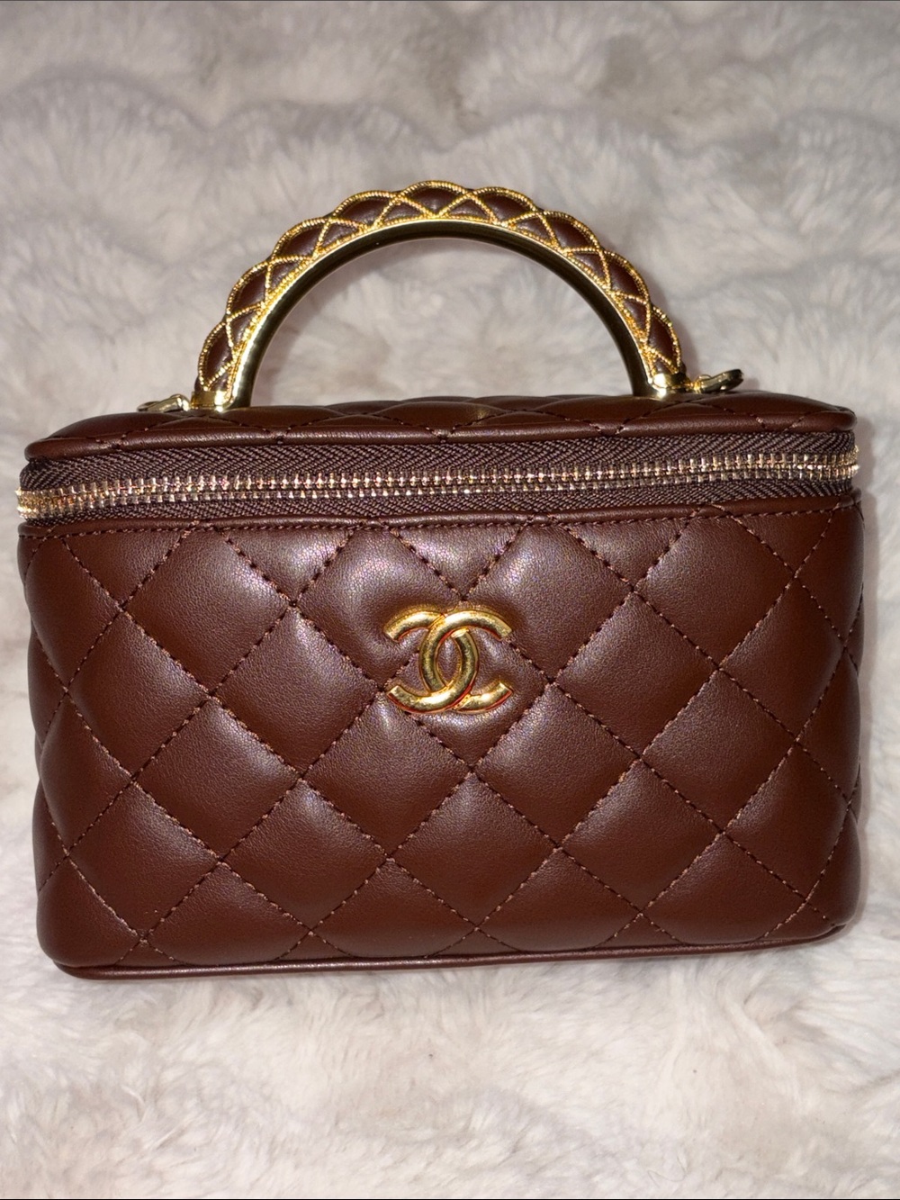 Brown Quilted Mini Top-Handle Bag with Gold Hardware